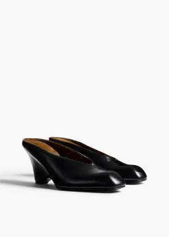 Khaite Mules-Colt Wedge in Black Glazed Leather