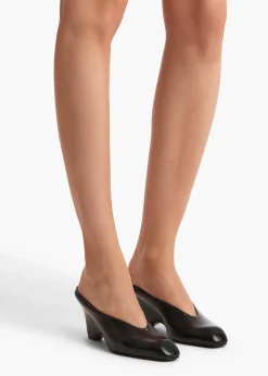 Khaite Mules-Colt Wedge in Black Glazed Leather