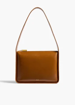 Khaite Shoulder Bags-Lori Squared Bag in Dark Honey Crackle Patent Leather