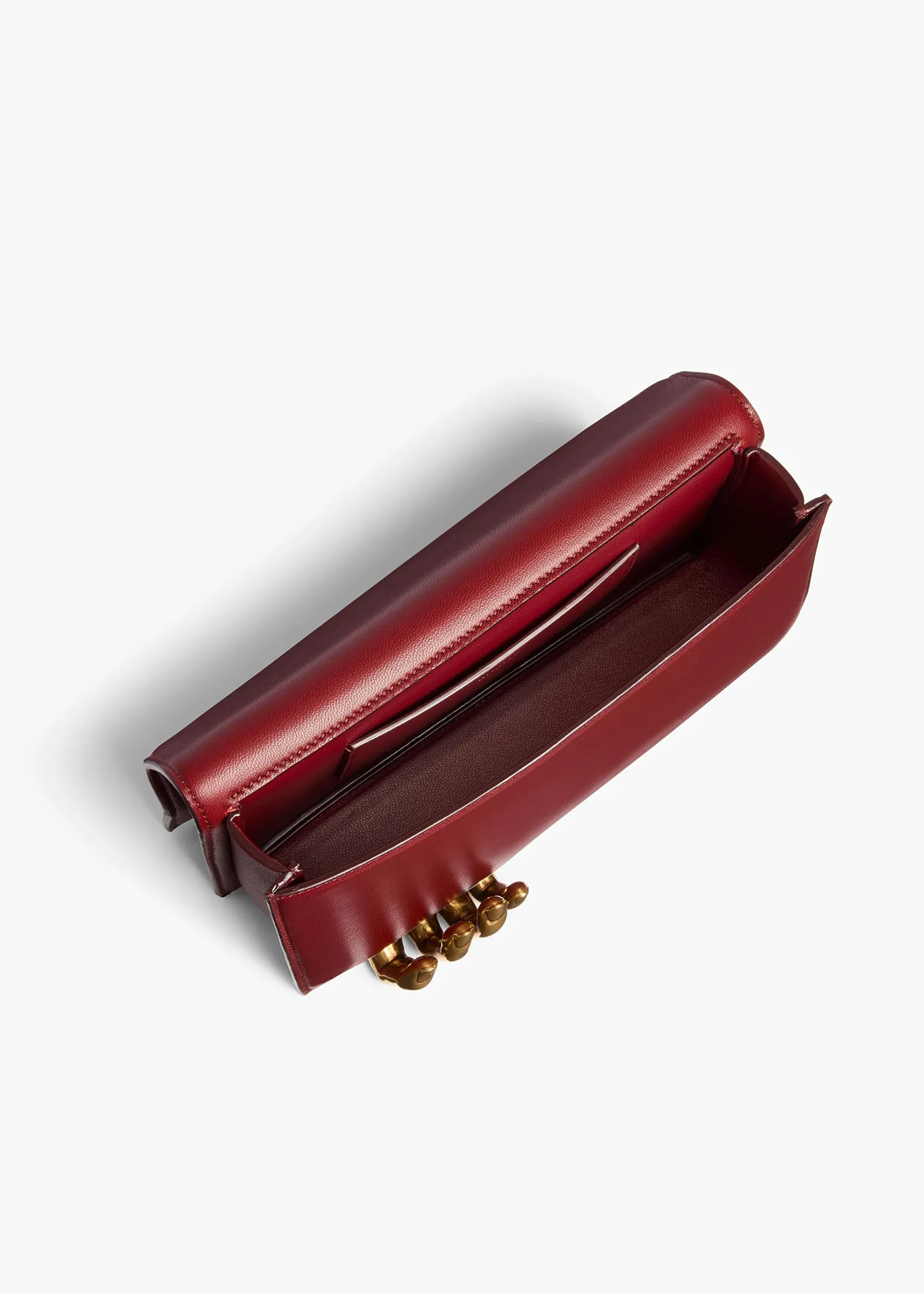 Khaite Evening-Sculpted Hand Clutch in Oxblood Leather